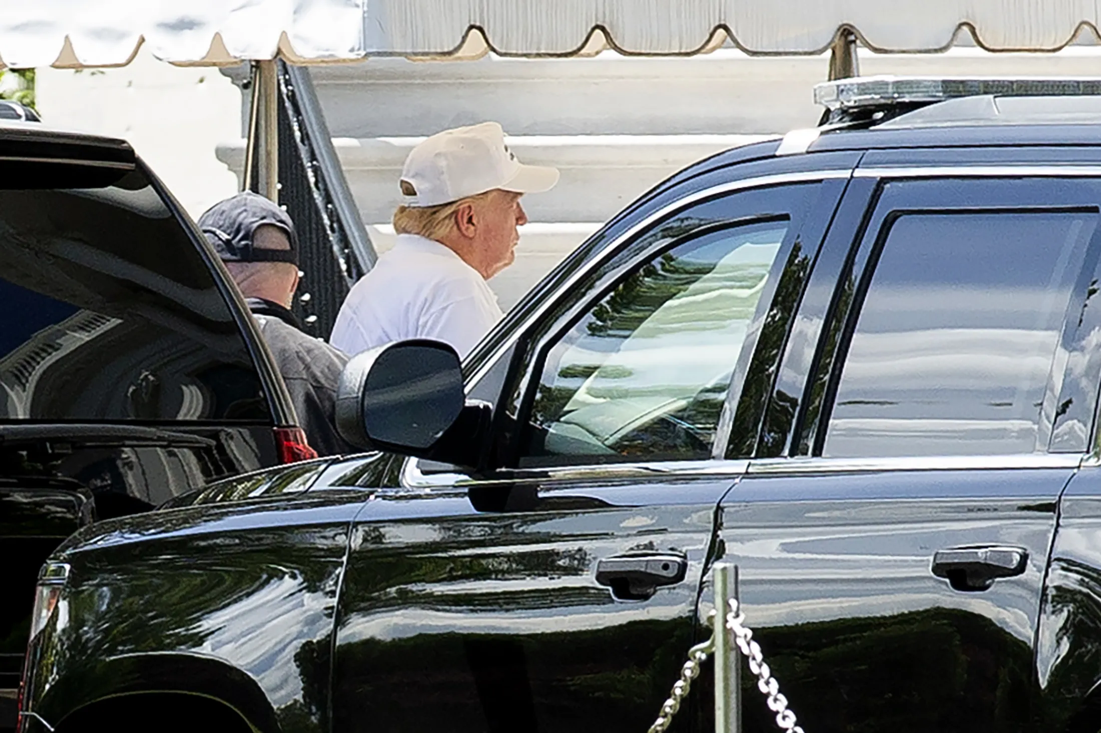 President Donald&nbsp;Trump walks in to the White House as he returns from Trump National Golf Club in Sterling, Virginia on May 23.