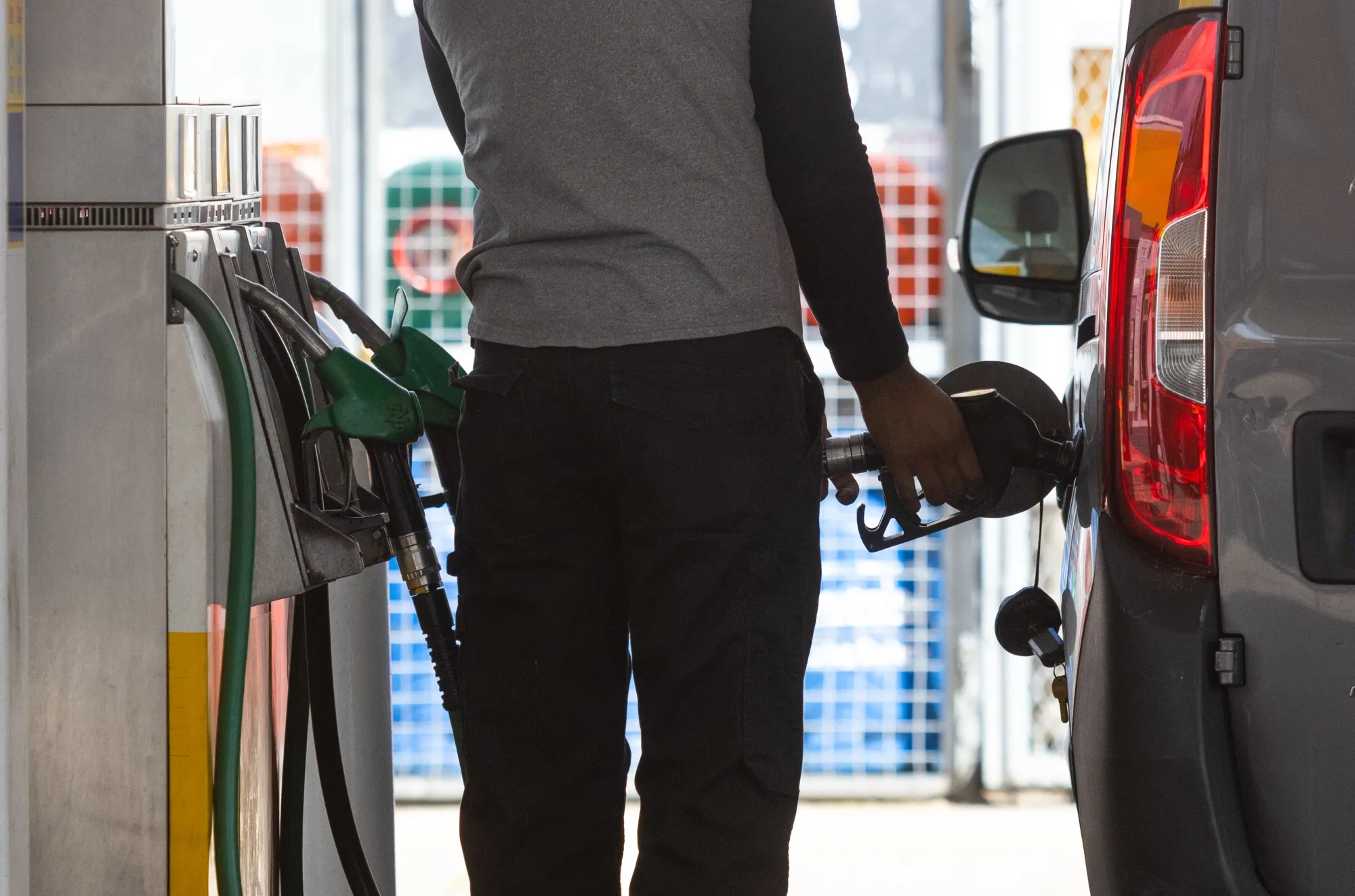 A customer fills their van at a petrol station in London, UK.