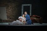 This image released by the Detroit Opera shows Soprano Marlen Nahhas as Mimi, left, and tenor Matthew White as Rodolfo in a scene from Detroit Opera's production of Puccini's &quot;La Boheme,&quot; in which the four acts are played in reverse order. (Noah Elliott Morrison/Detroit Opera via AP)
