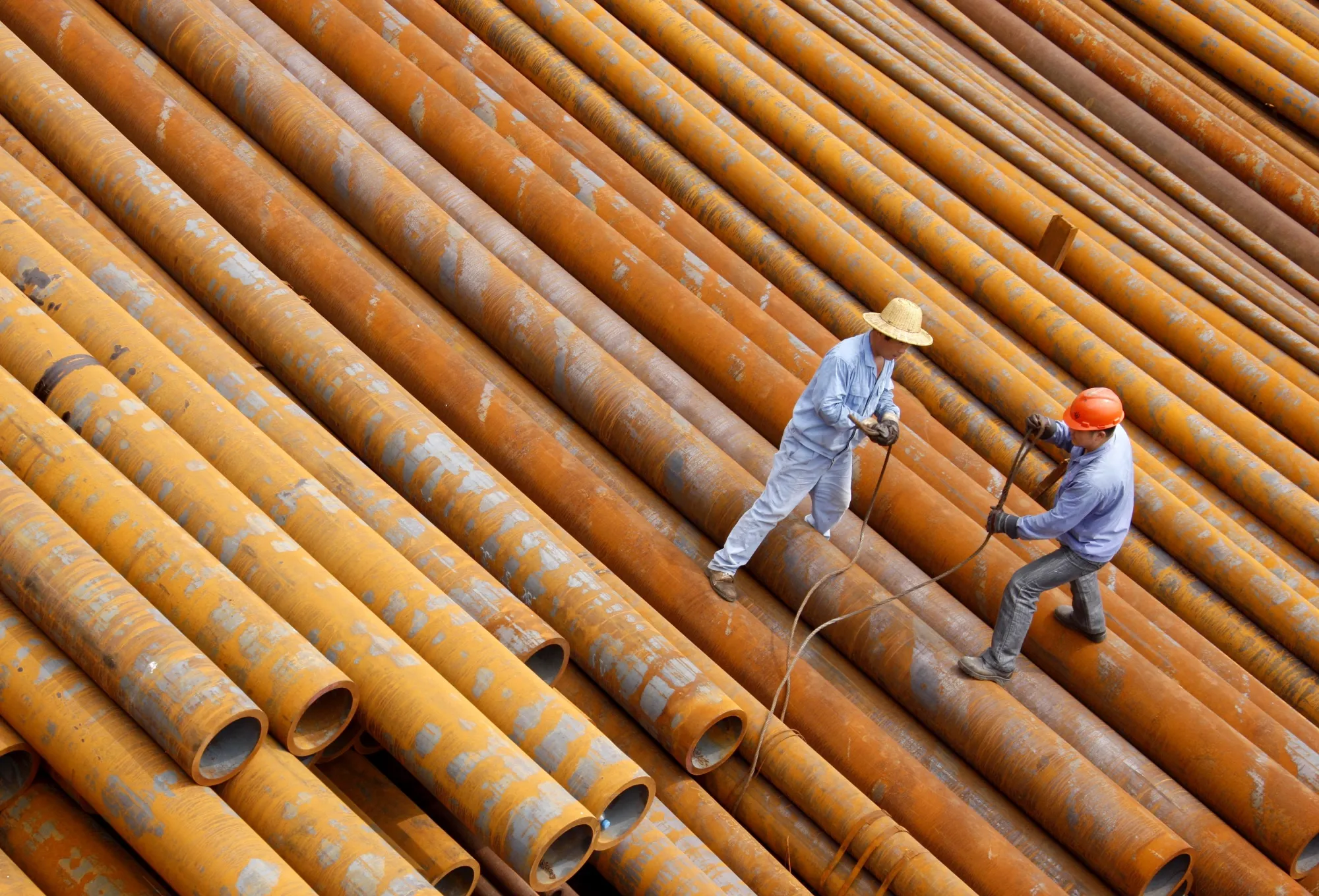 Laborers work at an iron and steel plant in Huaibei, China.