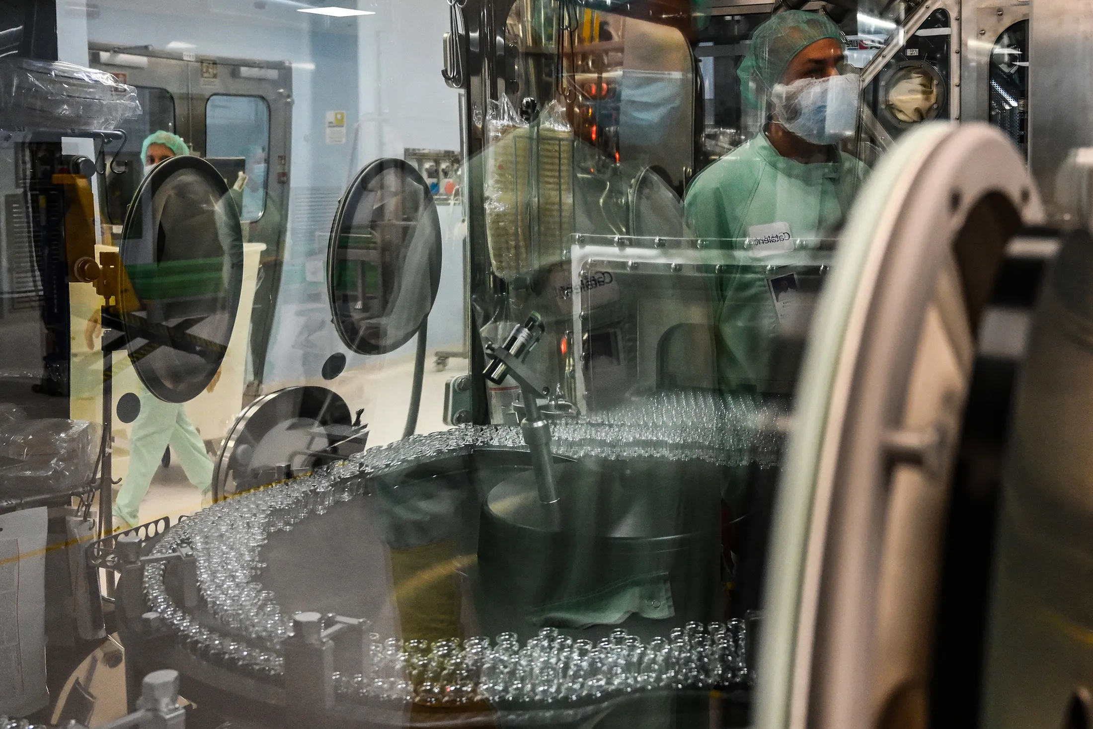 Laboratory techs run tests for the large-scale production and supply of a Covid-19 vaccine at the Catalent Inc. facility in Anagni, Italy, on Sept. 11, 2020.