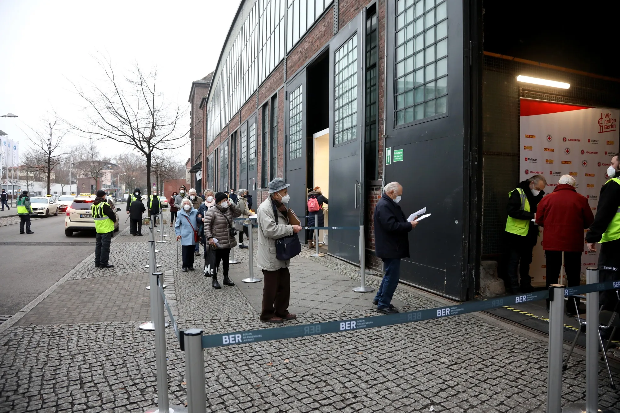 People queue for Covid-19 vaccinations in Berlin.&nbsp;Germany’s infection rate has climbed to 165 per 100,000 people.