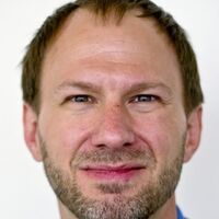 headshot of Tim Duy