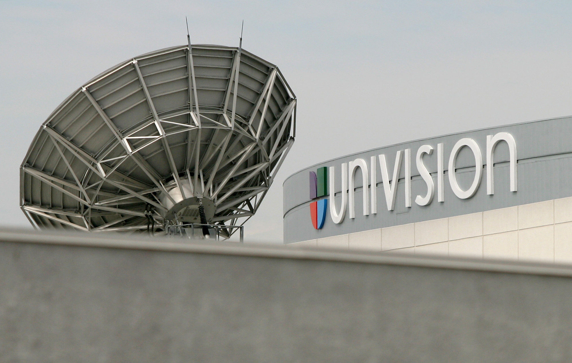 A satellite dish is positioned on the roof of Univision Communications Inc. in Los Angeles.