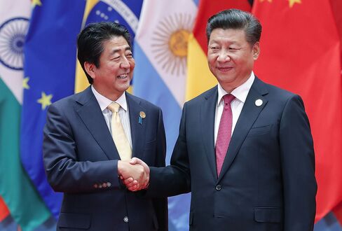 Shinzo Abe and Xi Jinping at the G20 Summit on Sept. 4