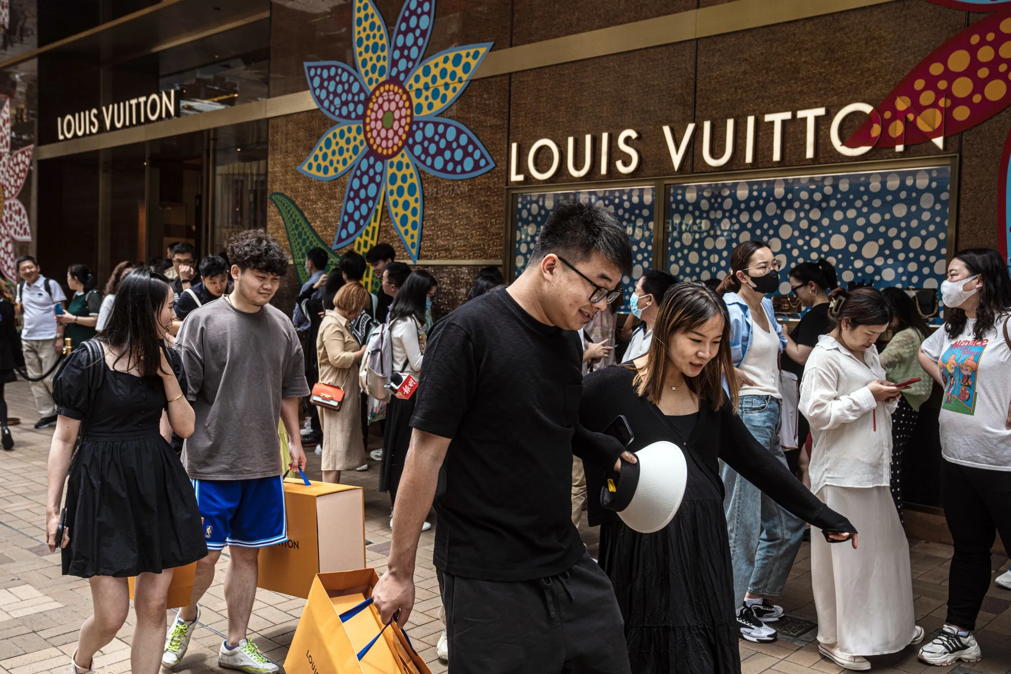 Shoppers on Canton Road, Hong Kong.