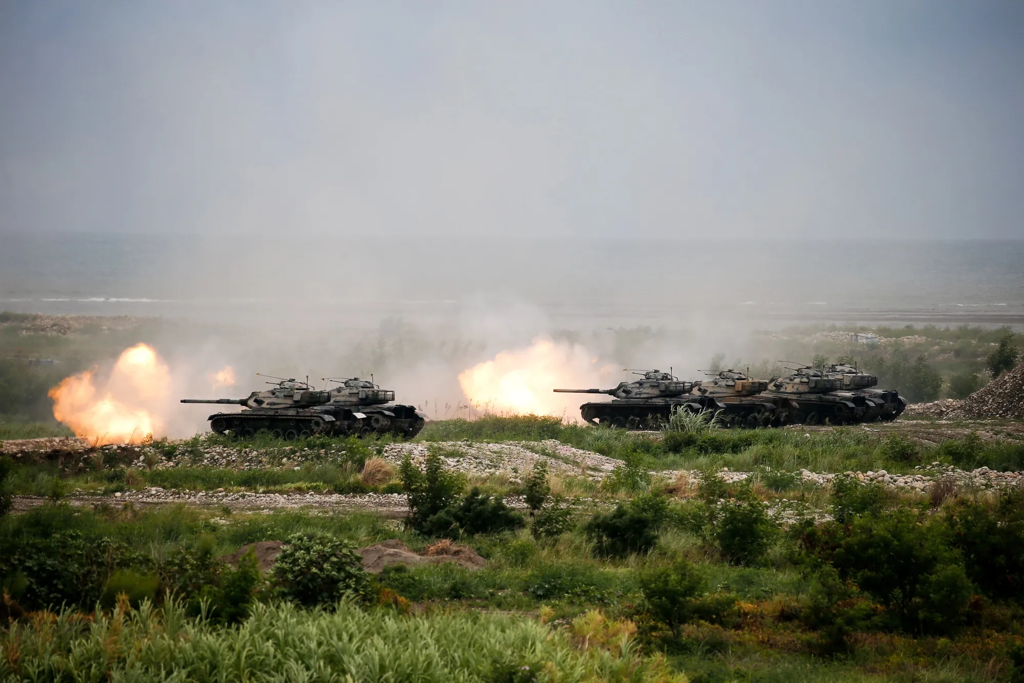 CM-34 Clouded Leopard eight-wheeled armored vehicles fire munitions during the&nbsp;annual Han Kuang military exercise in Taichung, Taiwan, in 2020.&nbsp;