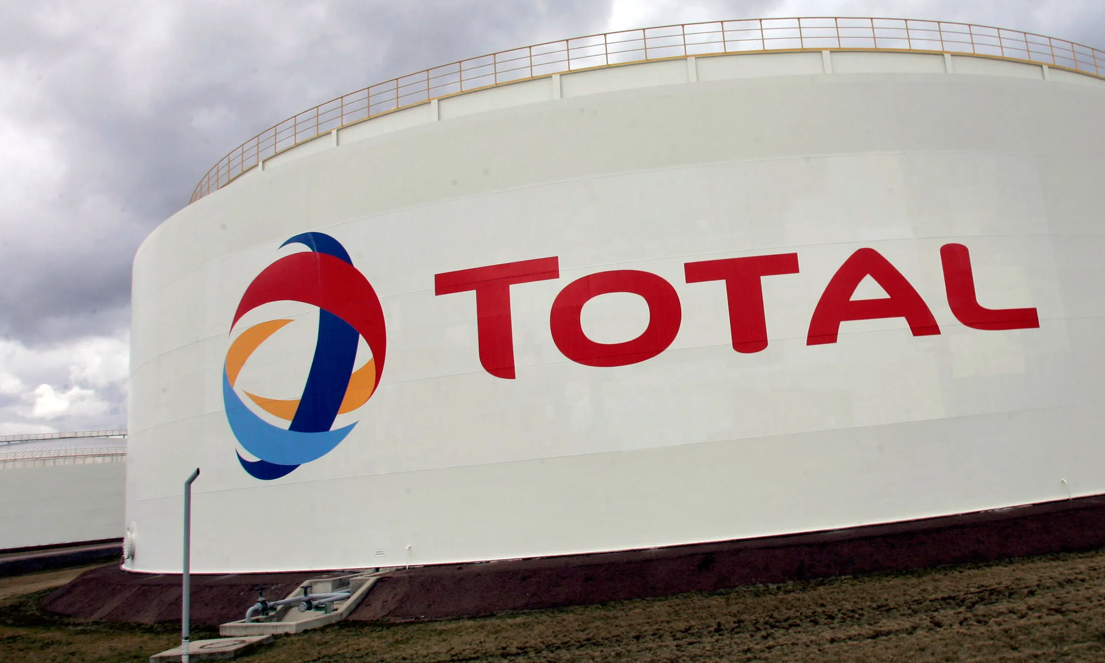 The Total SA logo is seen at a Total oil refinery in Spergau, Germany, Friday, March 31, 2006.
