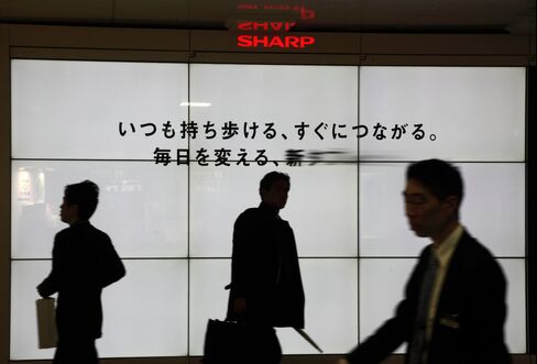 Sharp May Offer Buyouts as It Cuts Jobs After Lowering Outlook