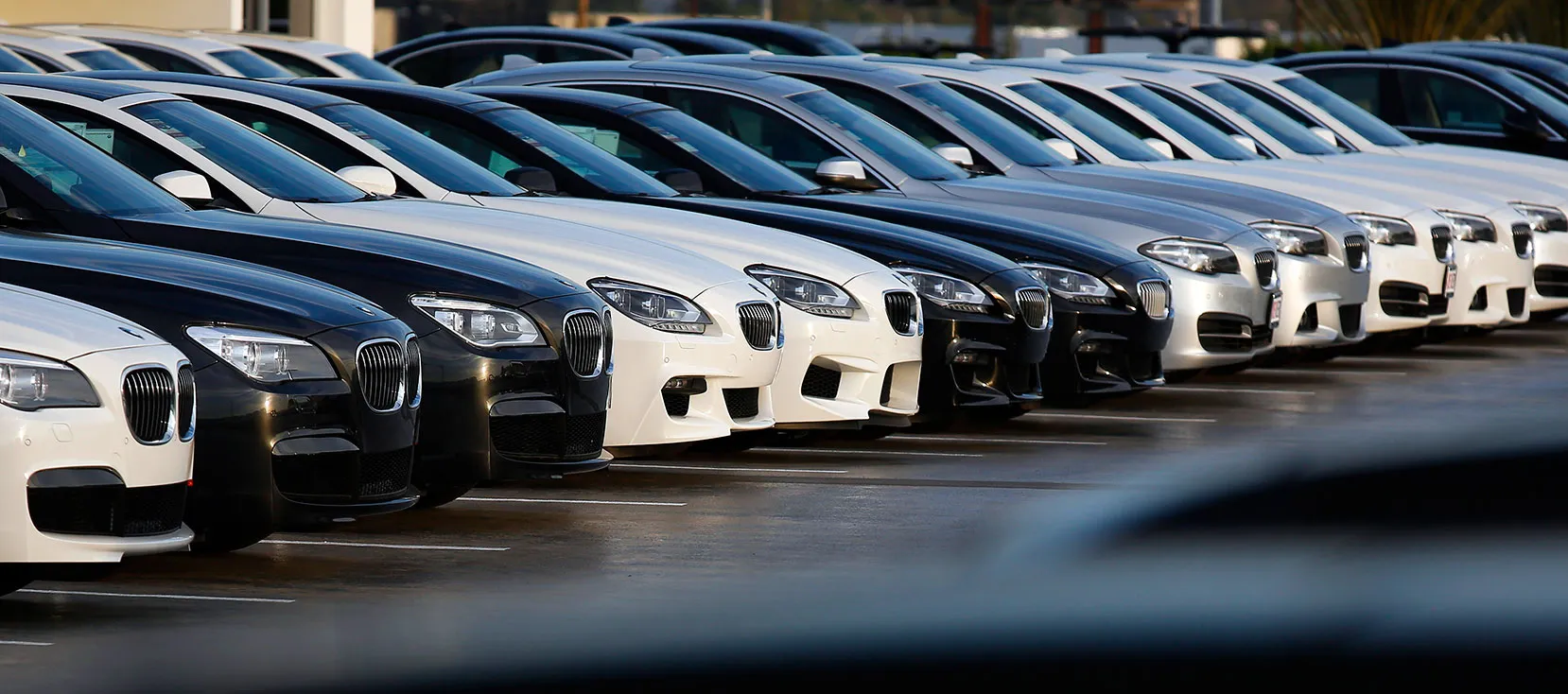 New BMW cars are displayed for sale at the Crevier BMW dealership in Santa Ana, California, U.S., on Monday, June 2, 2014.
