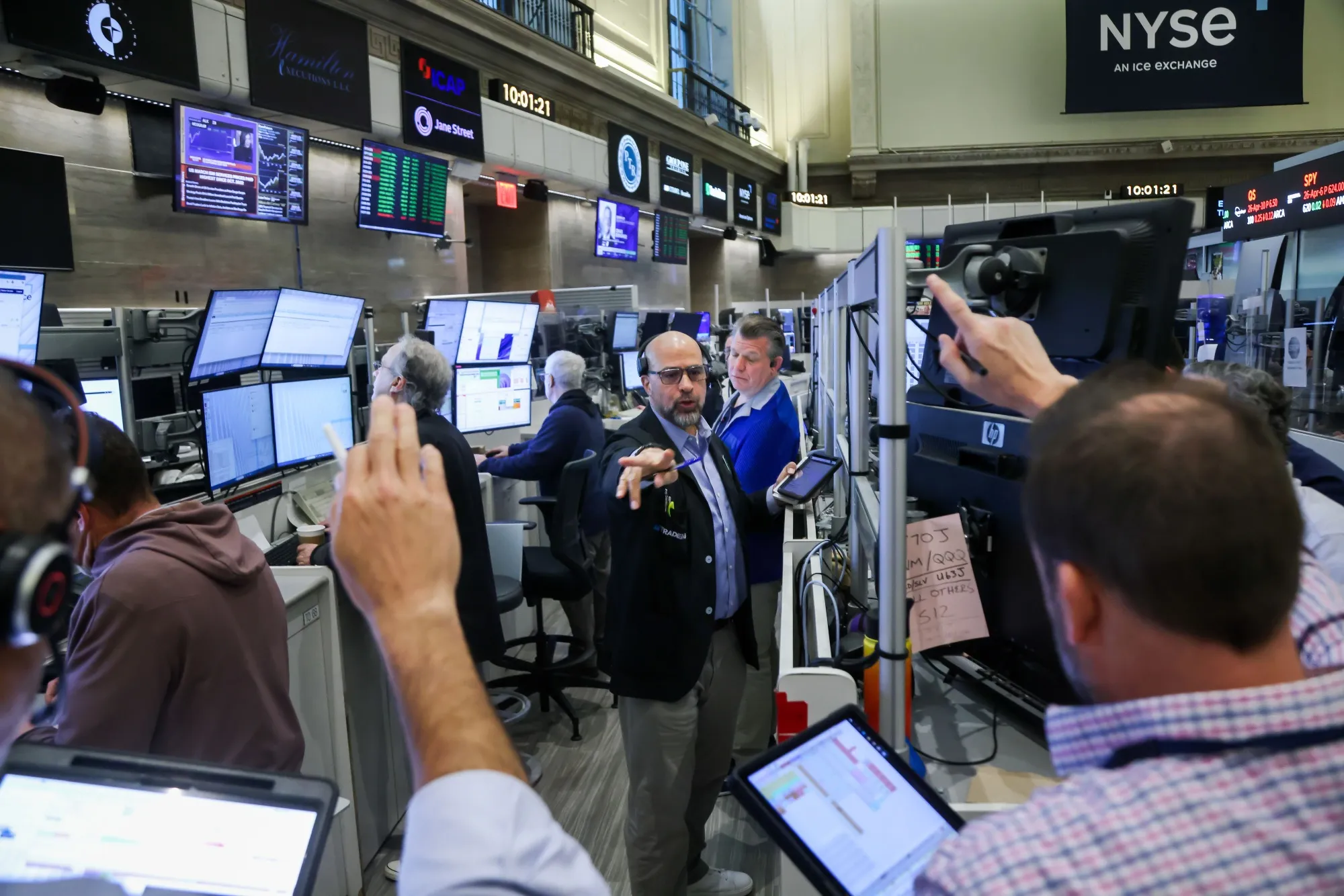 Traders work on the floor of the New York Stock Exchange.