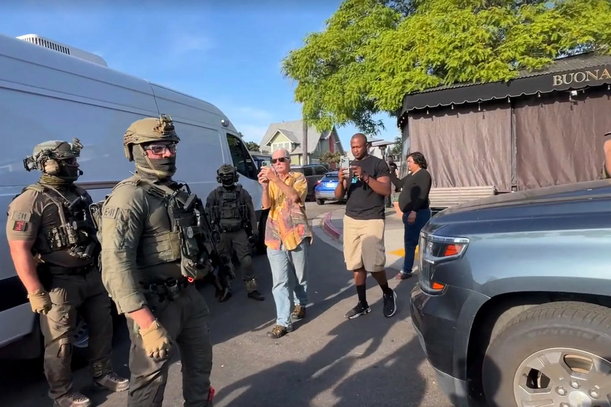 ICE agents execute a criminal search warrant at Buona Forchetta in San Diego on May 30.