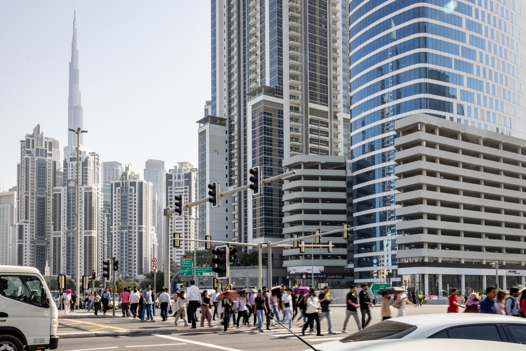 Pedestrians in the Business Bay financial district of Dubai, United Arab Emirates, on Wednesday, March 4, 2026. The US State Department urged Americans to leave the Middle East, citing 