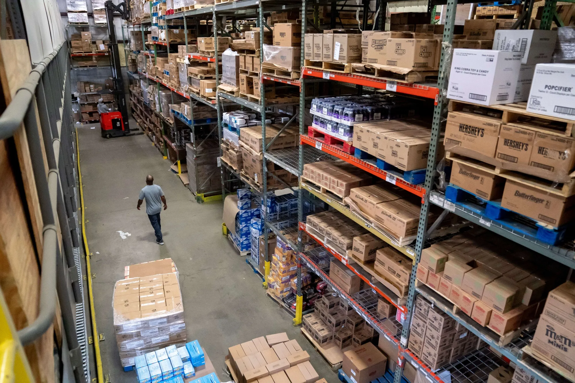 Workers stock shelves at a&nbsp;distribution center&nbsp;in Baltimore, Maryland.