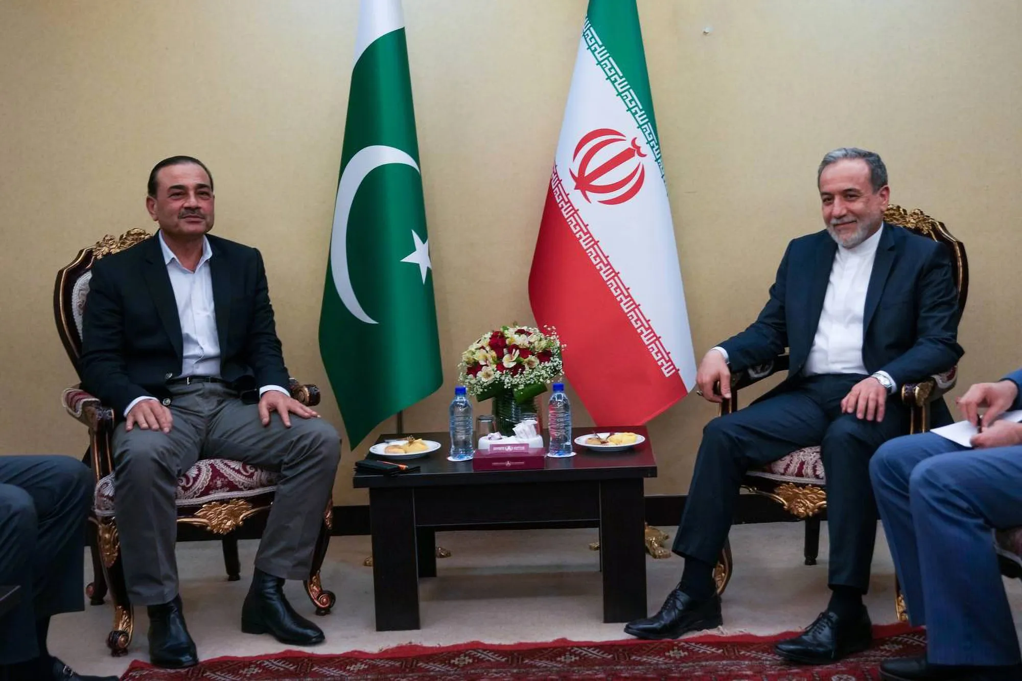 Asim Munir, left, with Abbas Araghchi in Tehran on April 15.