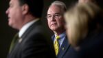 Representative Tom Price looks on during a news conference in Washington on March 17, 2015.
