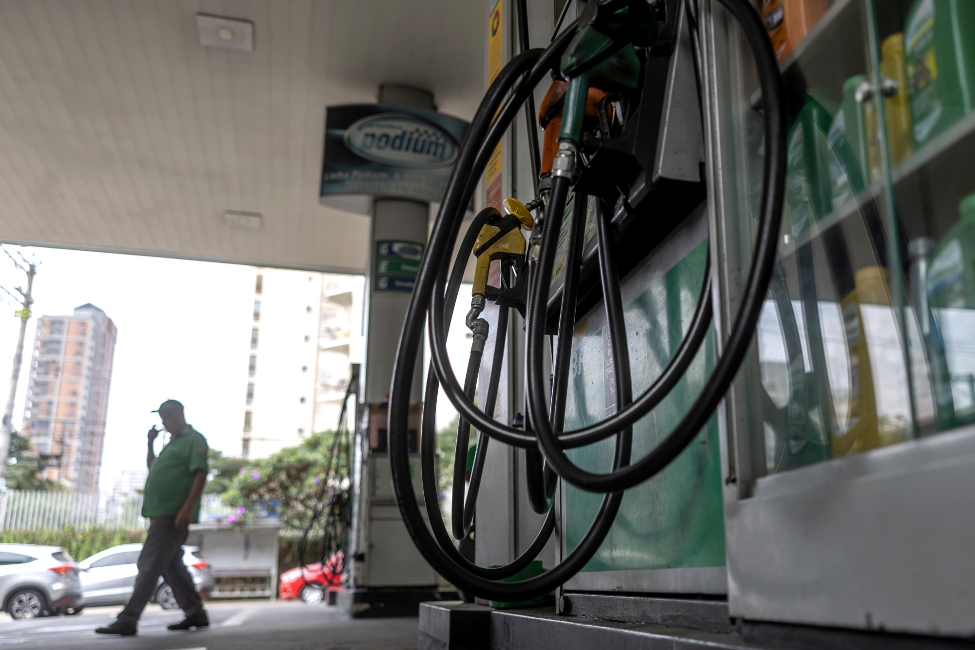 A worker at a Petrobras gas station in Sao Paulo, Brazil, on Thursday, May 16, 2024. Brazil's president shook up the leadership of Petrobras, the nation's state-owned oil company, by firing the chief executive officer and one of his top deputies after months of sparring.