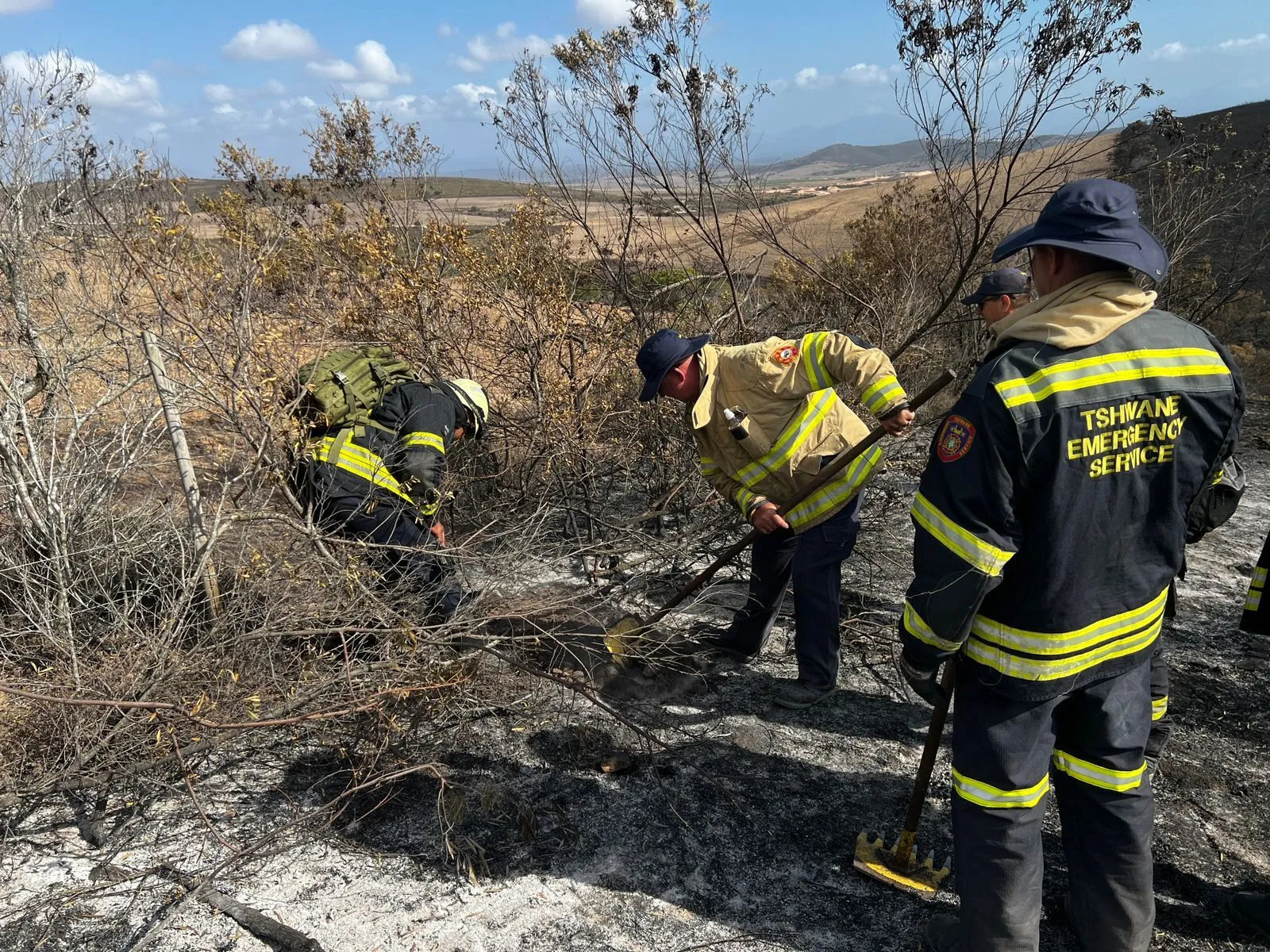 Emergency services tackle a wildfire in Mossel Bay, Western Cape, South Africa, on Jan. 11.