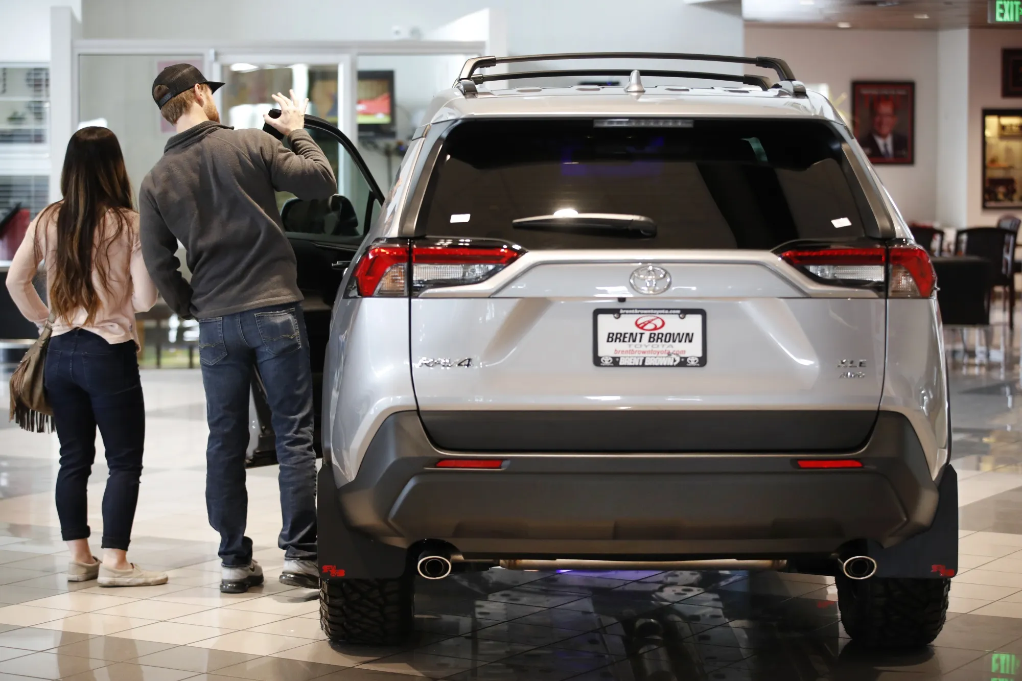 Customers at a Toyota dealership in Orem, Utah.