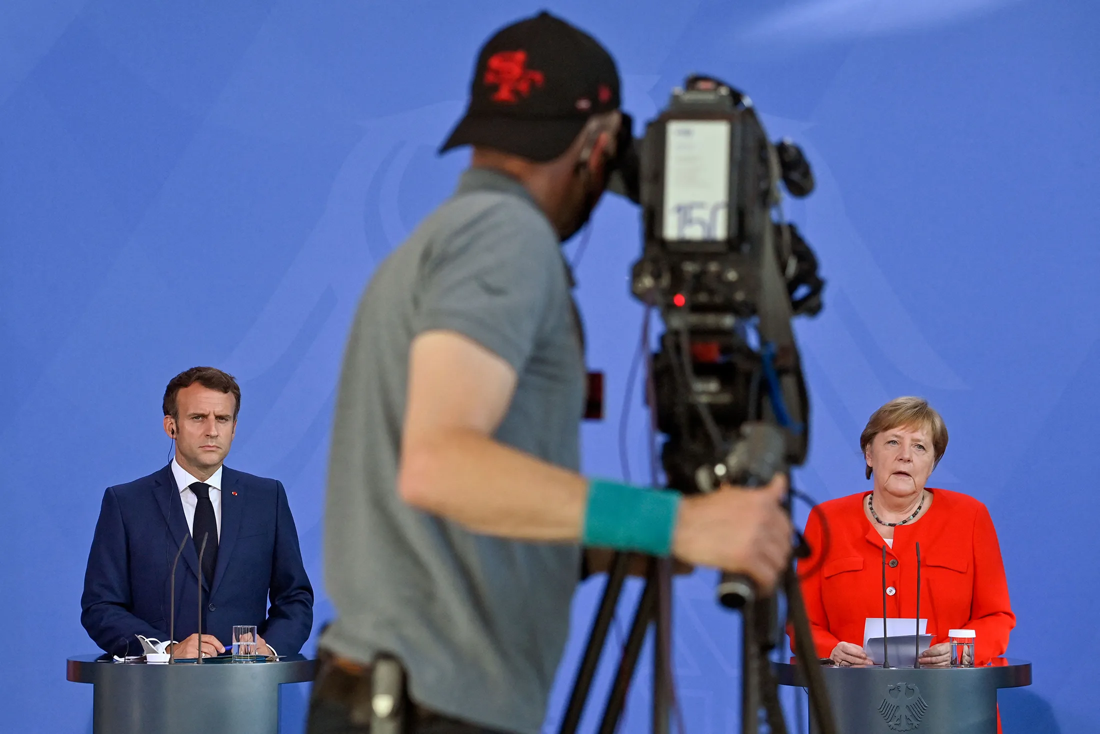 Emmanuel Macron and Angela Merkel&nbsp;urged China to ease restrictions for Europeans wanting to travel to the country.
