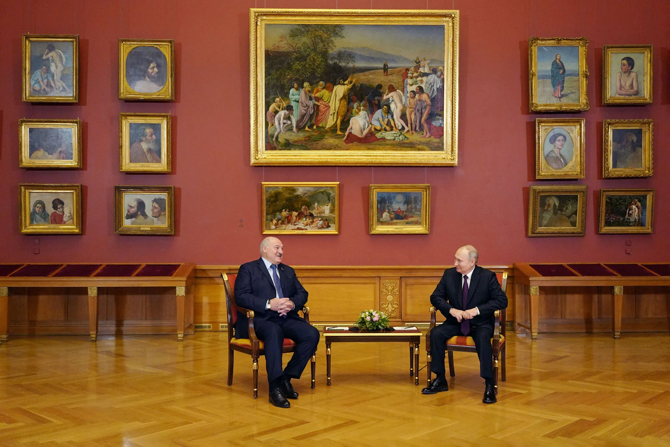 Russian President Vladimir Putin, right, speaks with his Belarus counterpart Alexander Lukashenko at the State Russian Museum in Saint Petersburg in December. 