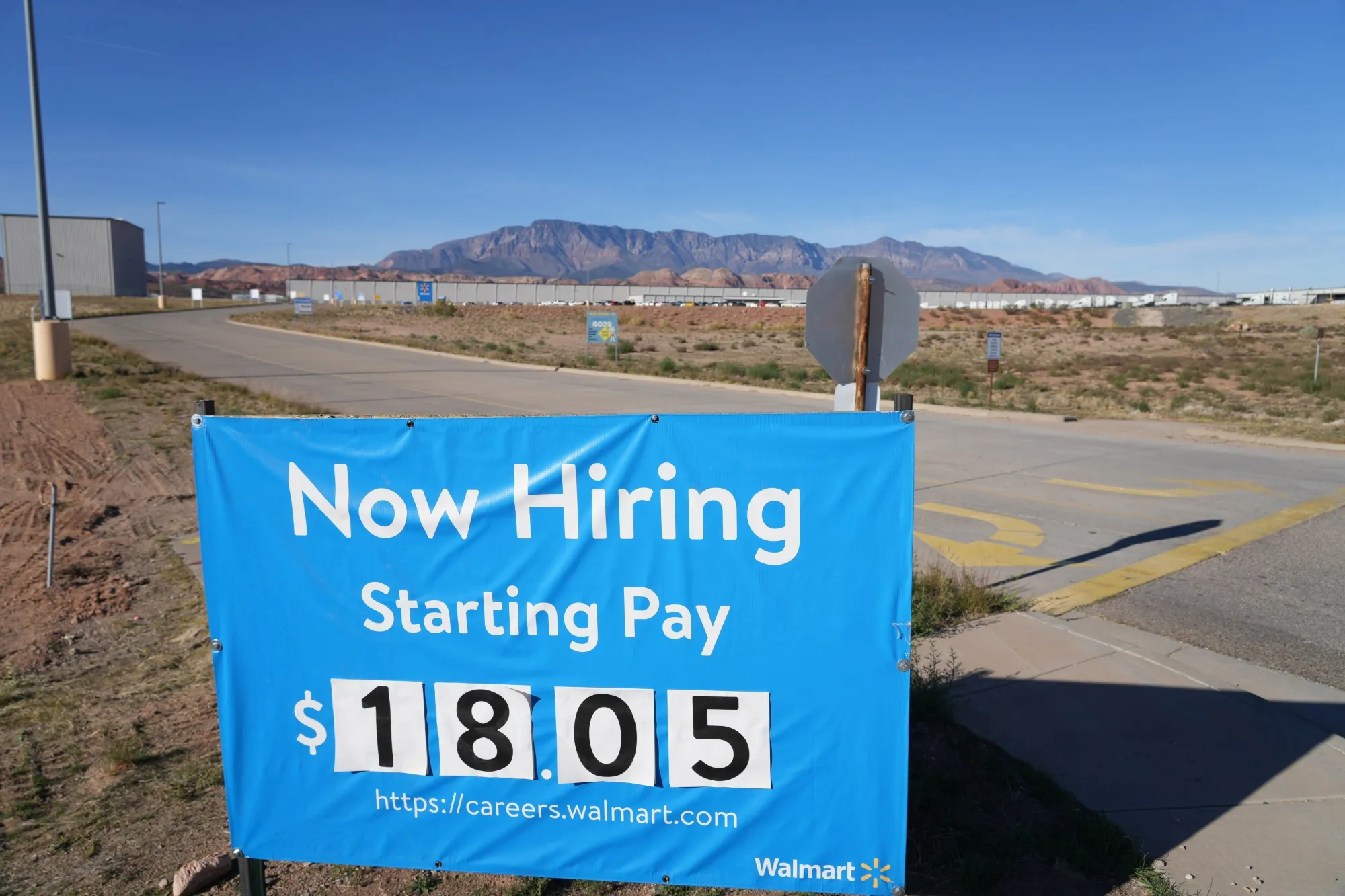 A “Now Hiring” sign outside a Walmart Distribution Center in Saint George, Utah.