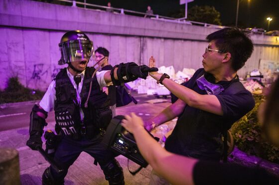 Hong Kong Tempts China’s Ire as Protests Take More Violent Turn