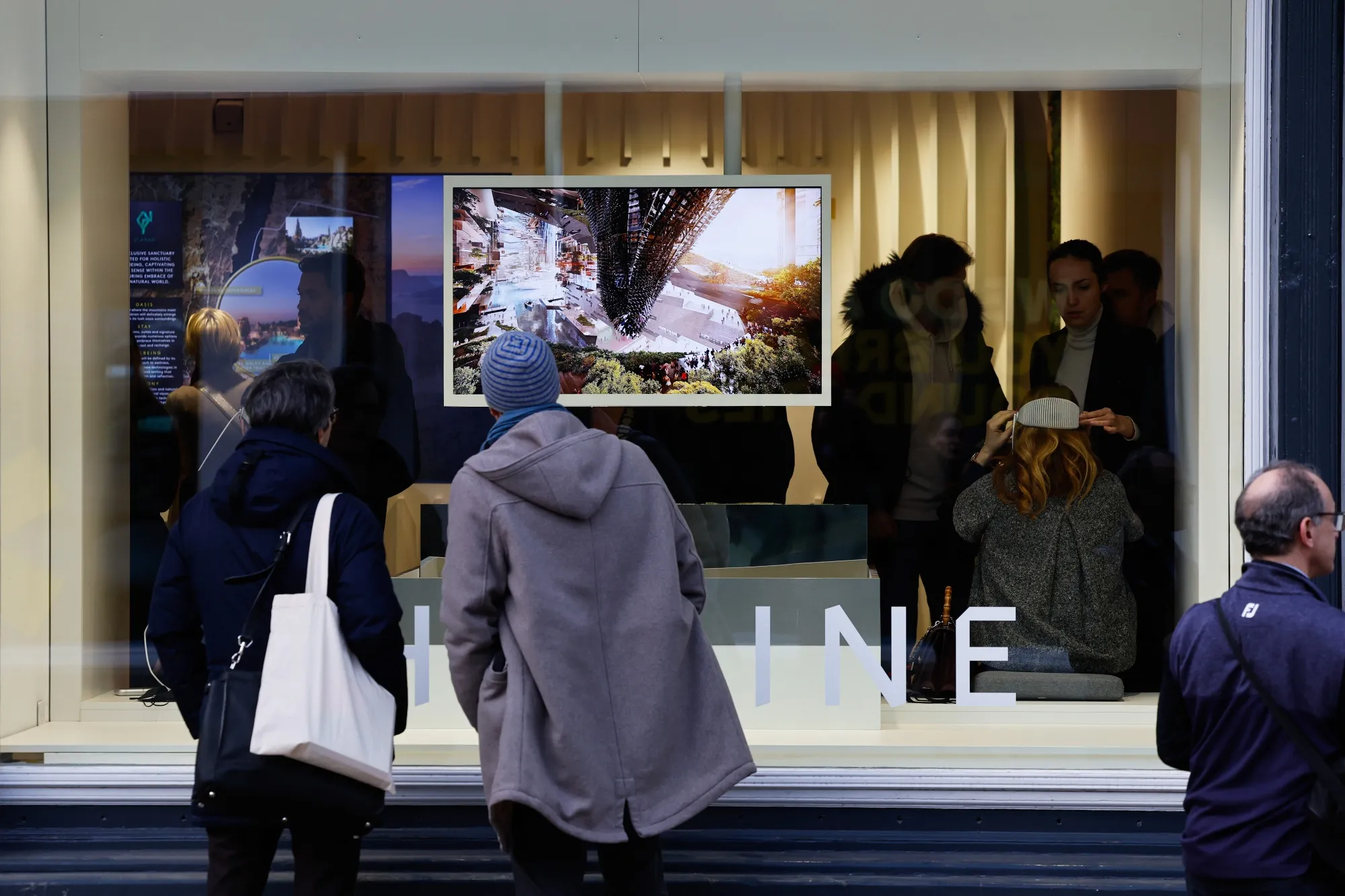Visitors look at information promoting Saudi Arabia's Neom megaproject in the Neom pavilion at World Economic Forum (WEF) in Davos, Switzerland, on&nbsp;Jan. 22.