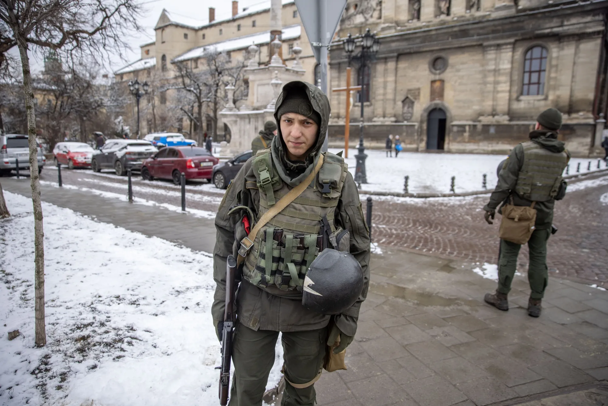 Ukrainian soldiers patrol a street in Lviv, Ukraine.