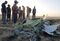 Workers Attend The Crash Site Of Ethiopian Airlines ET302 Flight To Nairobi