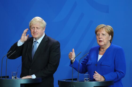 Merkel Sets Johnson Challenge: Solve Brexit Backstop in 30 Days