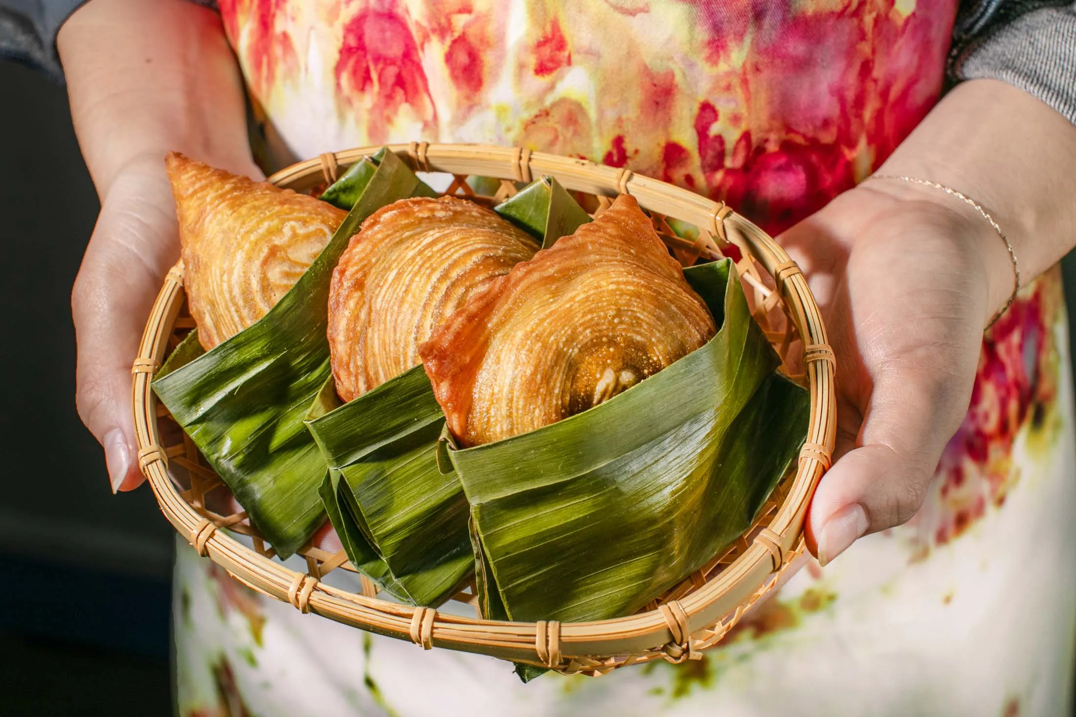 Caribbean patties, tucked in banana leafs,&nbsp;are the star of the show at&nbsp;Momofuku’s Bar Kabawa.
