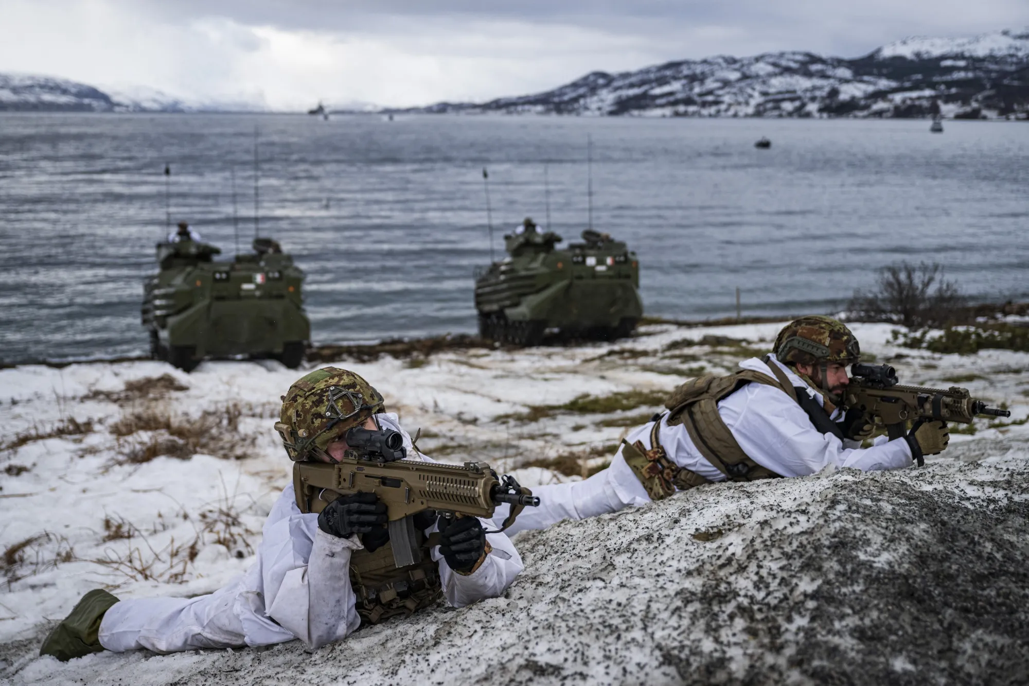 Italian Marines during an amphibious assault excercise, above the Arctic Circle.