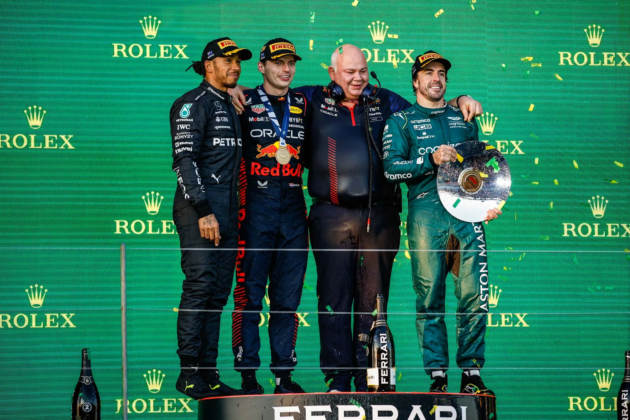Wearing hats (left to right): Lewis Hamilton of Mercedes, Max Verstappen of Oracle Red Bull and&nbsp;Fernando Alonso of Aston Martin&nbsp;with a friend (middle, right) during the Formula 1 Rolex Australian Grand Prix on April 2,&nbsp;2023.