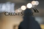 A Credit Suisse logo is displayed at a Credit Suisse Group AG bank branch in Bern, Switzerland, on Monday, Feb. 15, 2021.