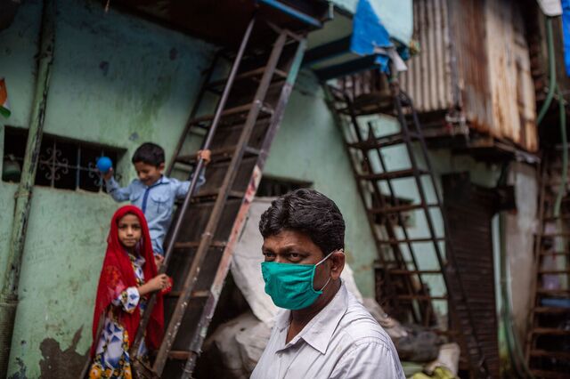 Khwaja Qureshi, a scrap factory owner whose work has come to a standstill because his workers were forced to flee for their lives during the lockdown, waits for them to return from their villages so his factory can resume work again. Dharavi, Mumbai. 17th July, 2020.