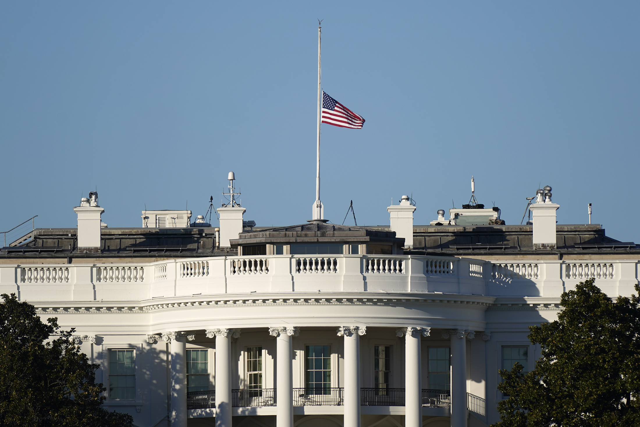 An American flag flies at half-staff above the White House in Washington, D.C. on Jan. 10.
