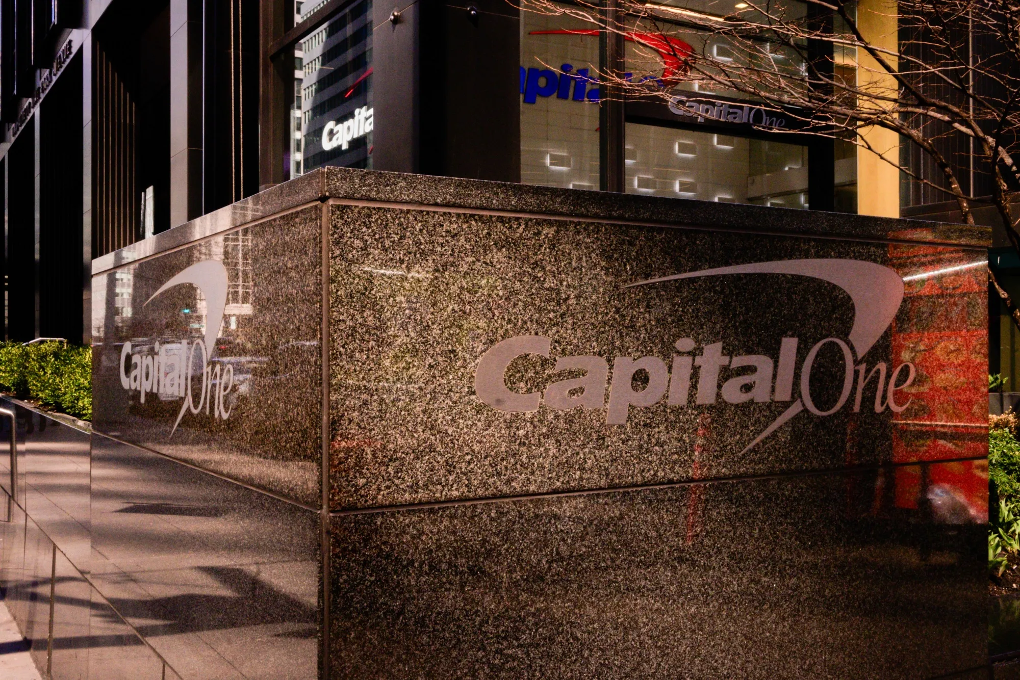 Capital One signage in front of a bank branch in New York