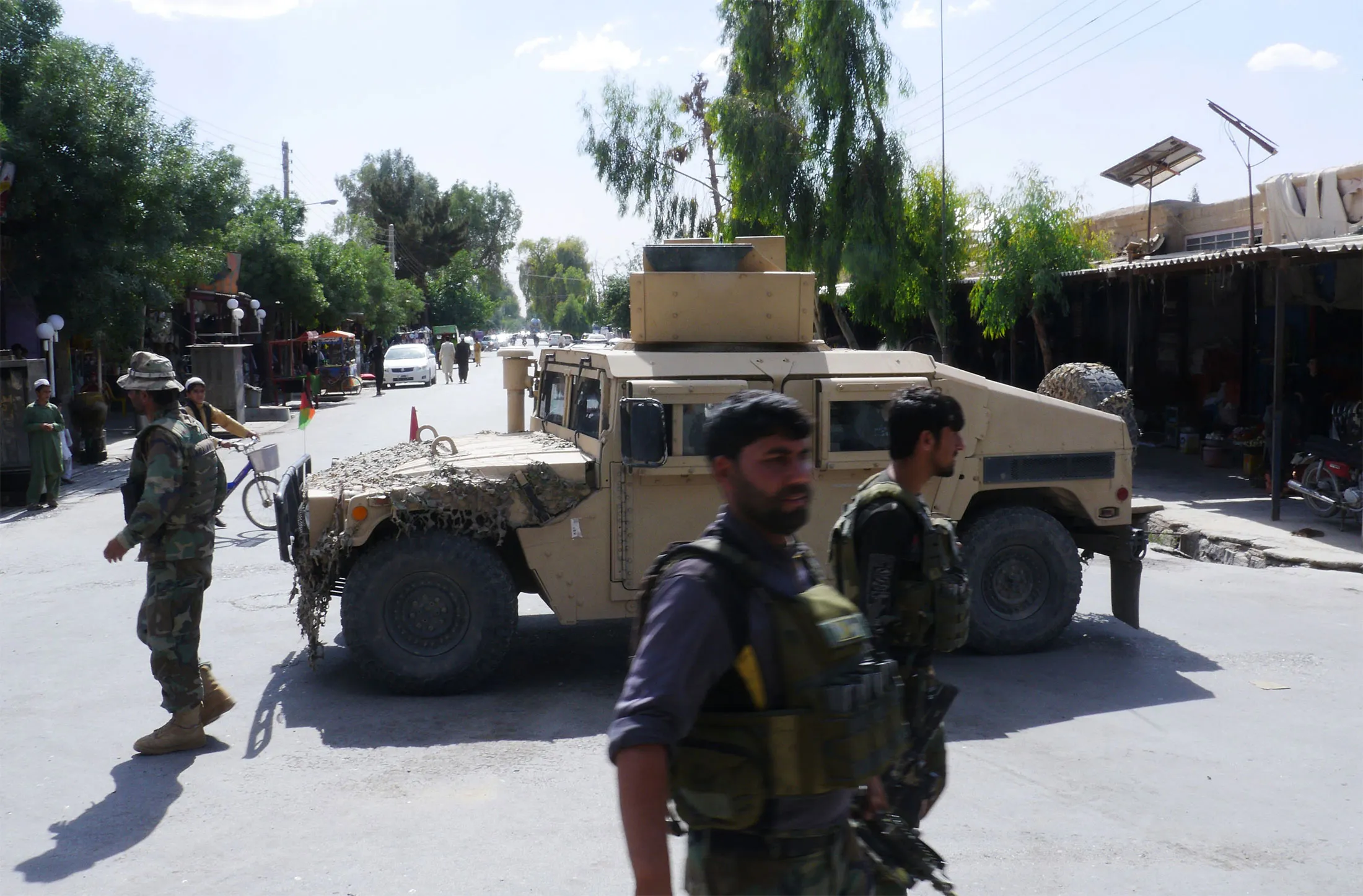 Afghan security forces patrol, after recapturing control of the city from Taliban militants, in Farah, Afghanistan, on May 19.