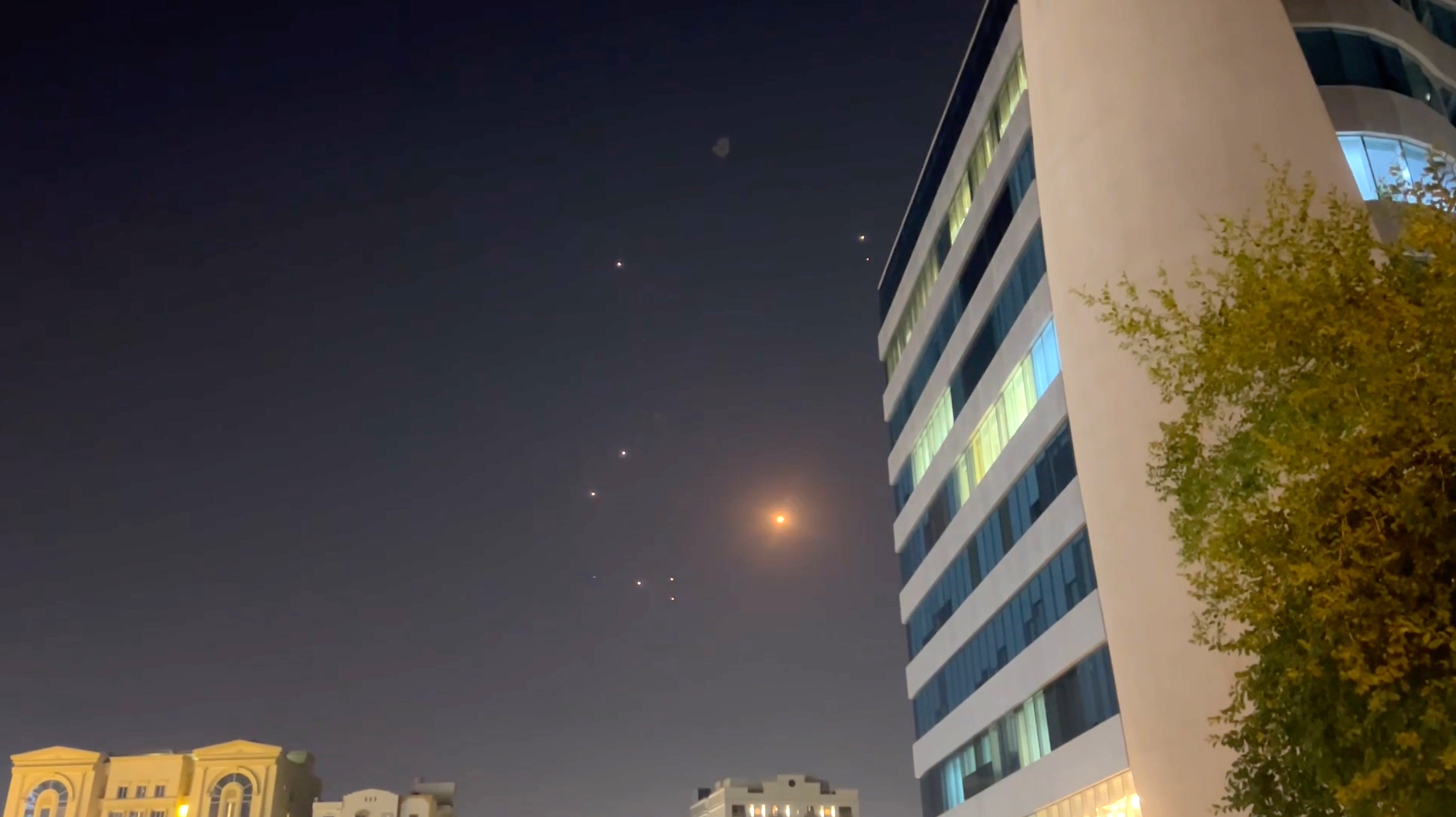 In this frame-grab made from video, missiles and air-defense interceptors over Doha after Iran launched an attack on US forces at Al Udeid Air Base on June 23.
