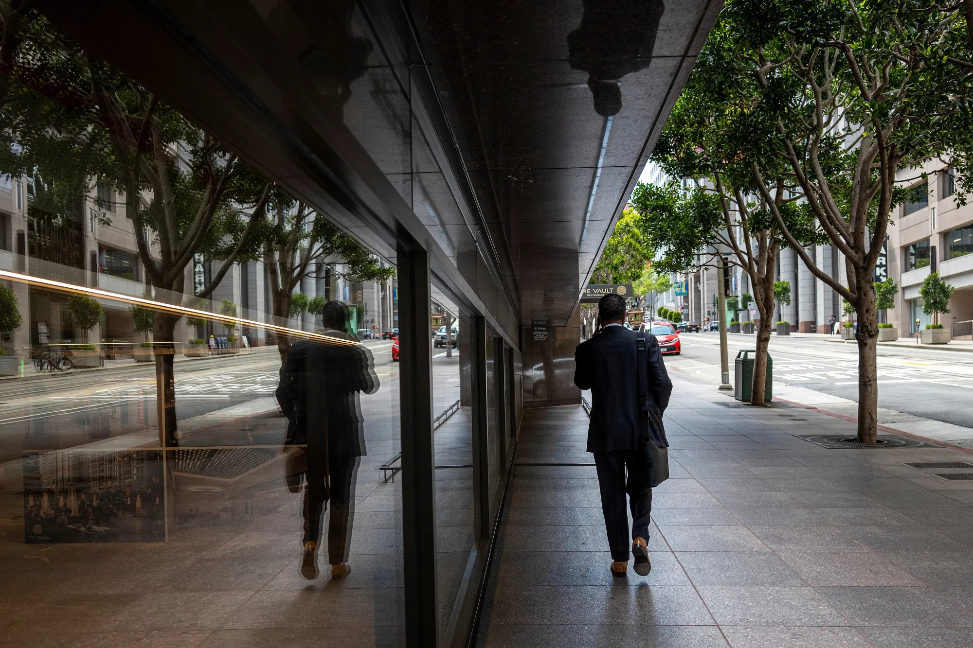 A pedestrian in the financial district of San Francisco.