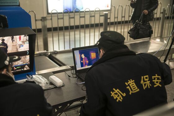China’s Surveillance State Pushed to the Limits in Virus Fight