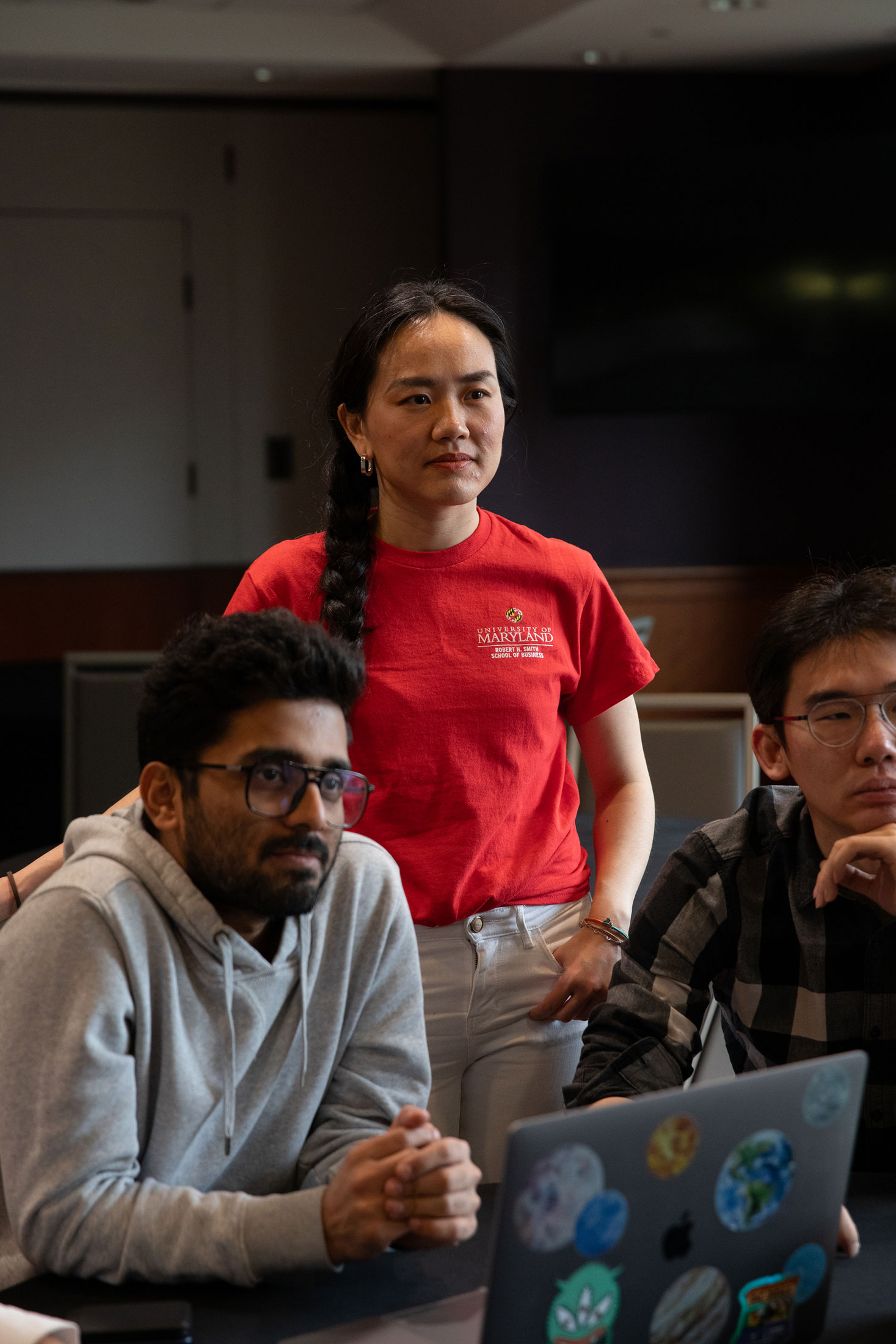 From left to right, International MBA students Shriram Kumar, 31, left, Caroline (Jingye) Yao, 35, center, and Zhuo Wang, 27, right, at the University of Maryland's Robert H. Smith School of Business. Photographer: Charlotte Kesl for Bloomberg Businessweek