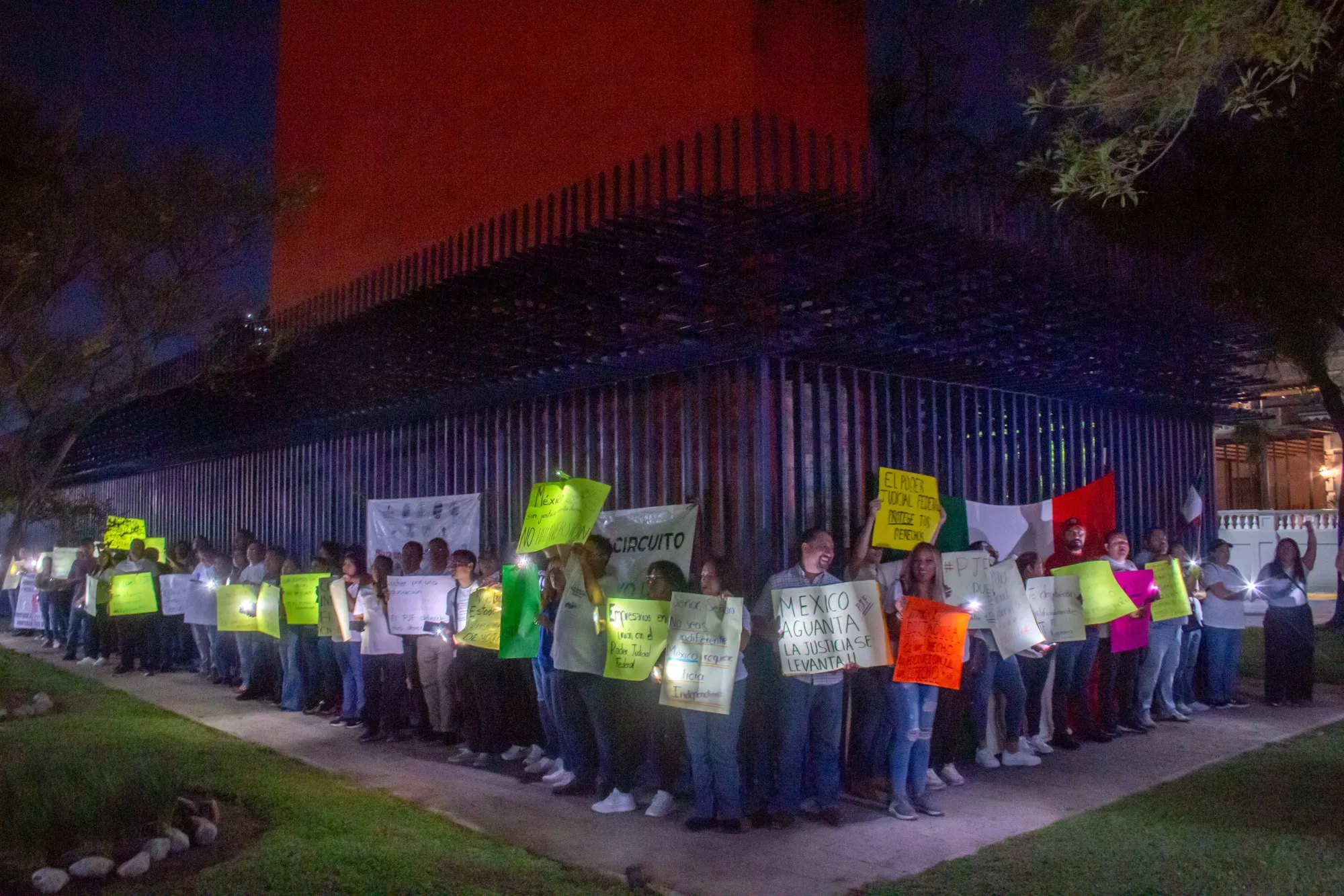 Judicial workers protest outside the Lighthouse of Commerce in Monterrey, Mexico&nbsp;on Oct. 9.