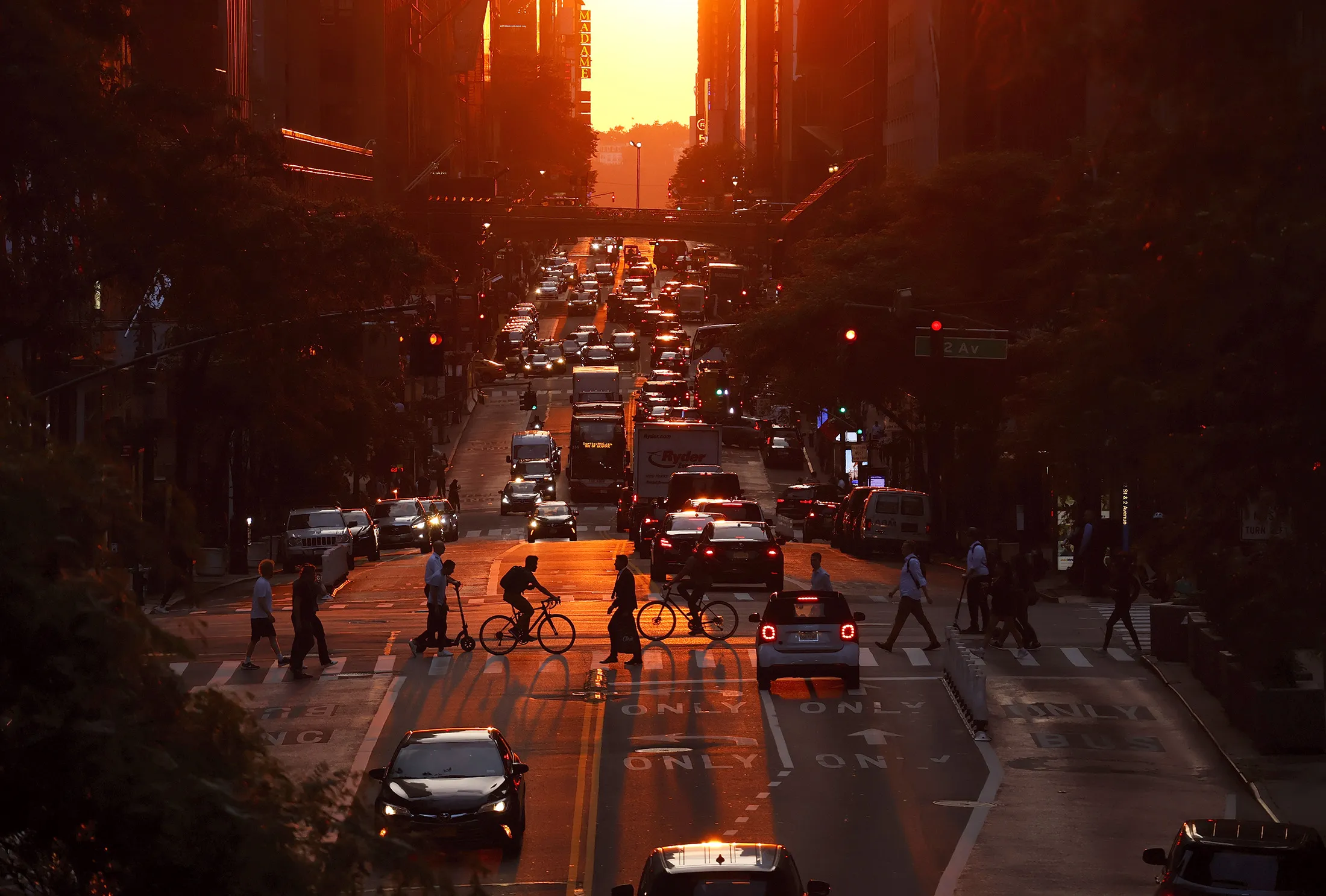 The sun sets along 42nd Street in New York on June 13.