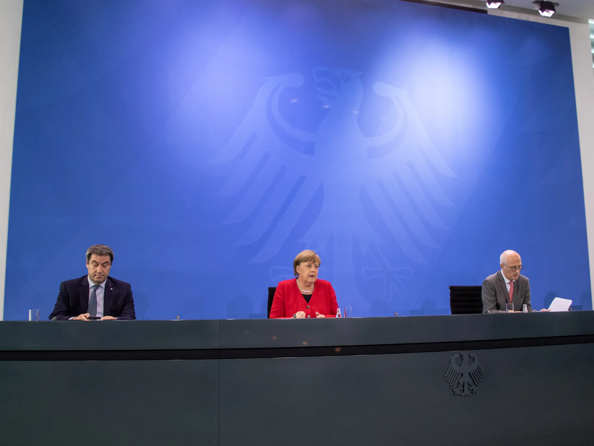 Angela Merkel, center,&nbsp;speaks on Germany’s easement strategy, in Berlin, on May 6.