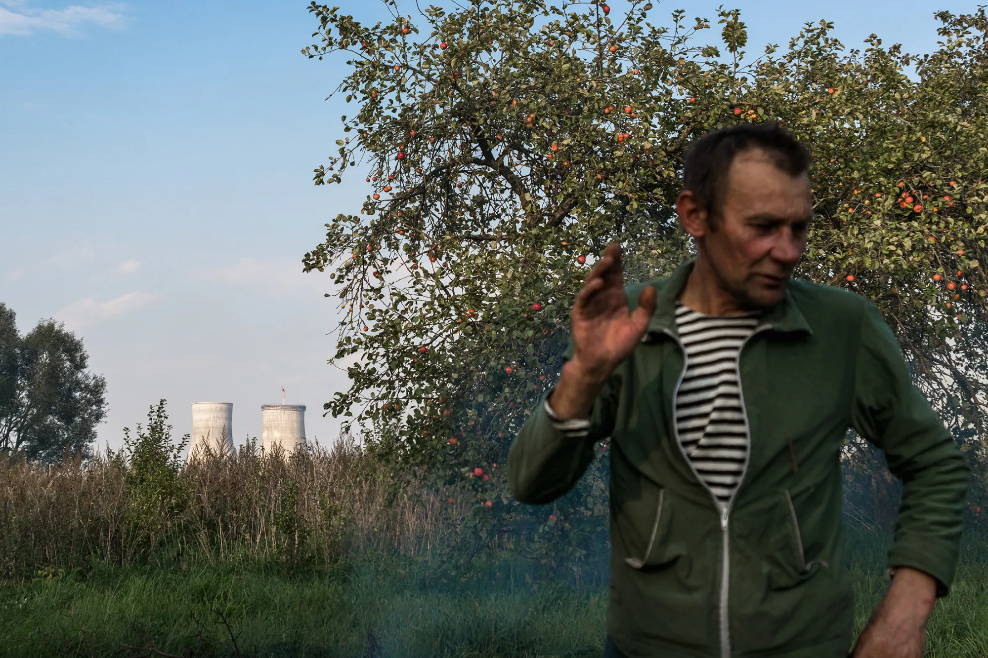 A villager living close to the Astravets nuclear power station cultivates his crops on Sept. 10, 2016.
