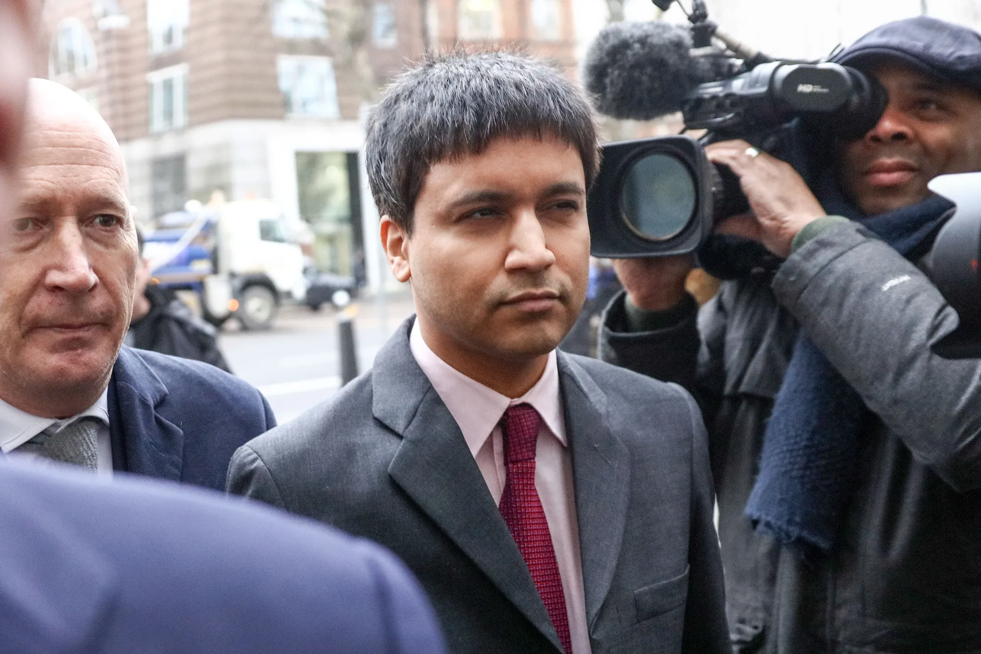 Navinder Singh Sarao, center, arrives at Westminster Magistrates' Court for his extradition hearing in London on Feb. 5, 2016.