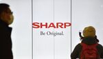 The logo of Sharp is displayed at a railway satation in Tokyo on February 17, 2017.