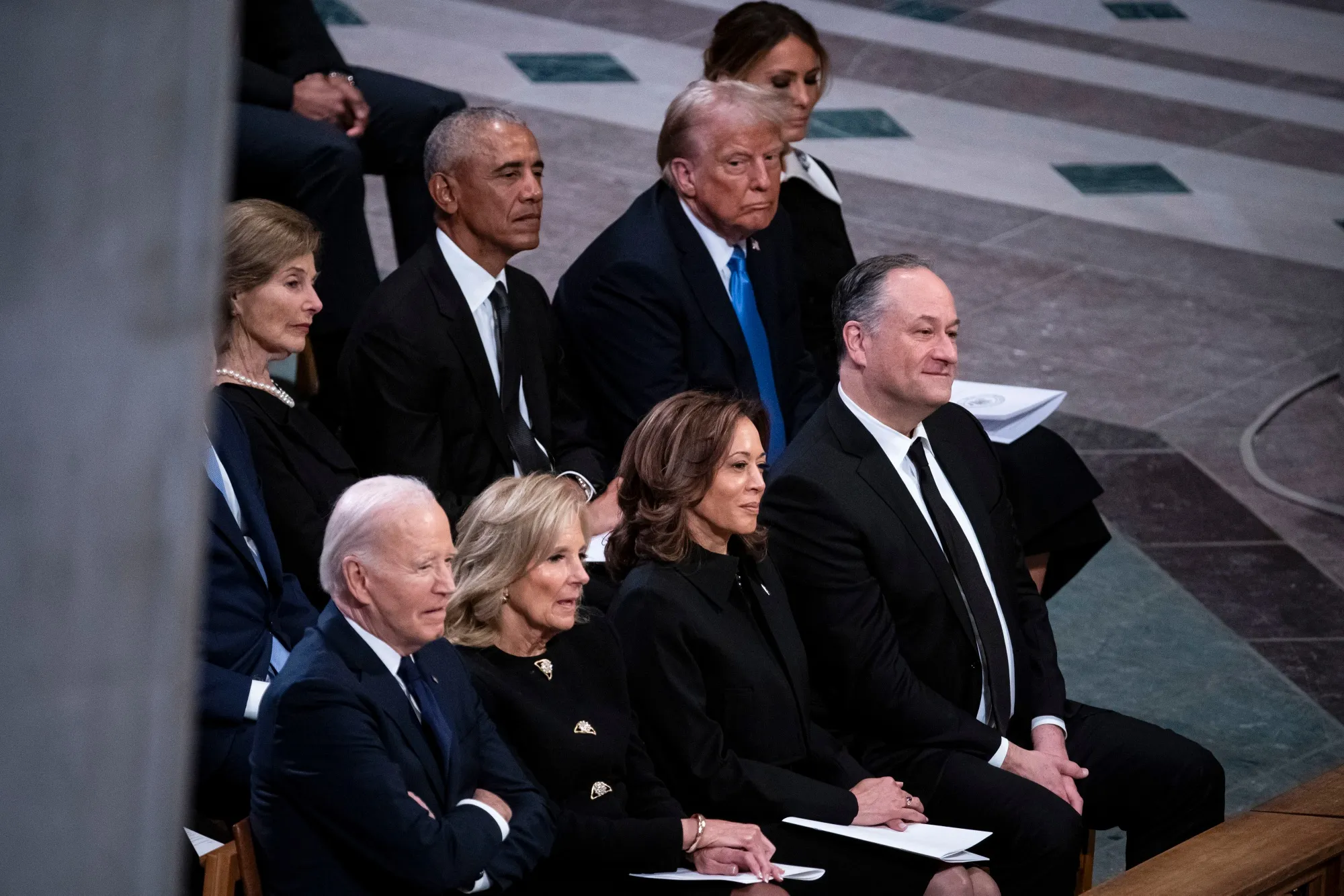 Paying their various respects.